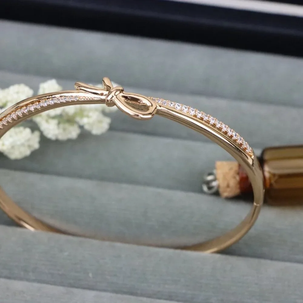 Rose Gold Bow Knot Bangle with Sparkling CZ Accents, XPBL0427